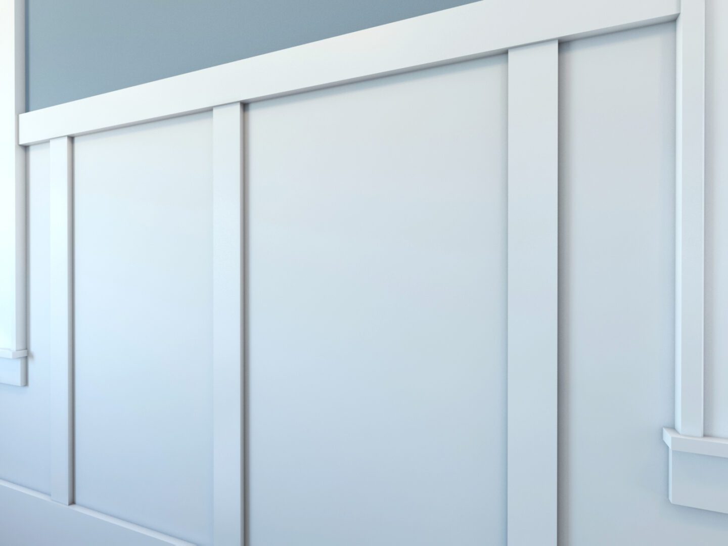 White sliding closet doors mounted on a light gray wall in a clean, modern room design.